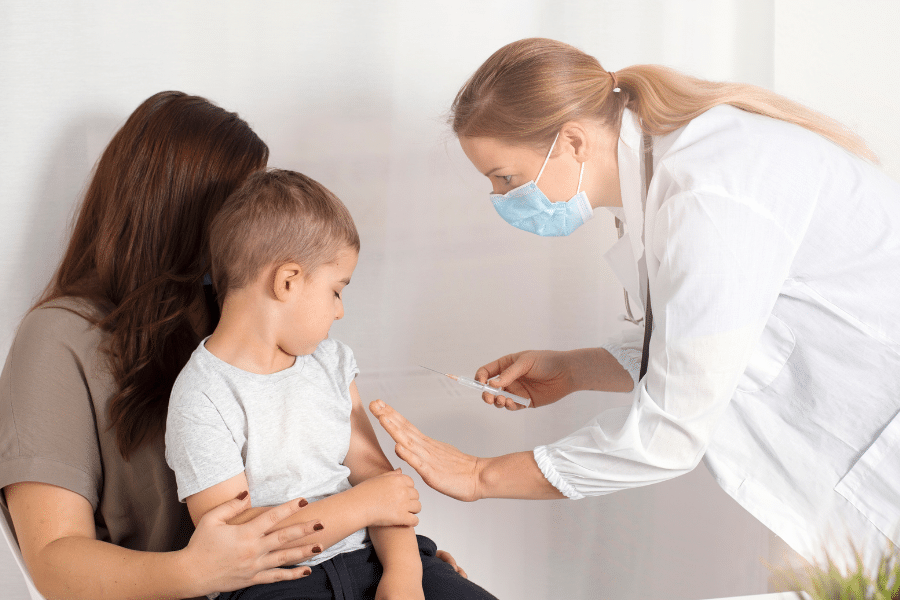child getting vaccinations